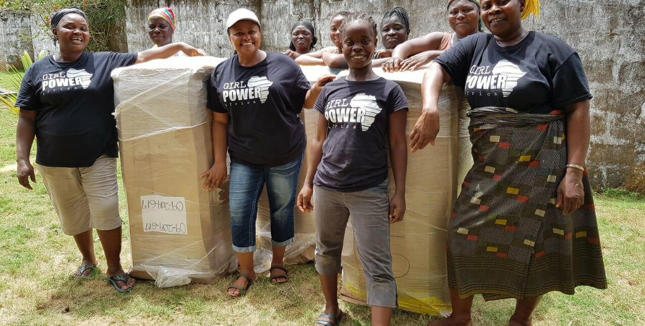 A group of women with large donation boxes